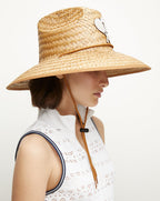 Chapeau de paille de raquette