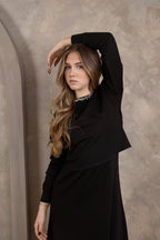 Pull en velours avec haut à col montant (modèle)